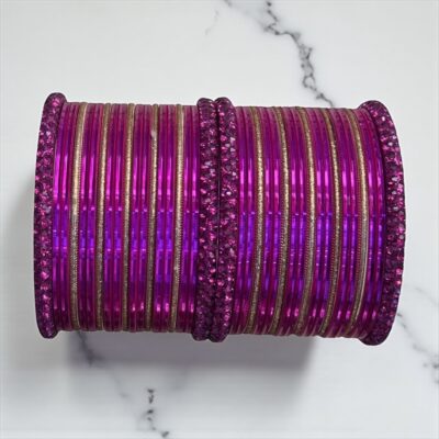 Pink glitter bangle pair with decorative patterns