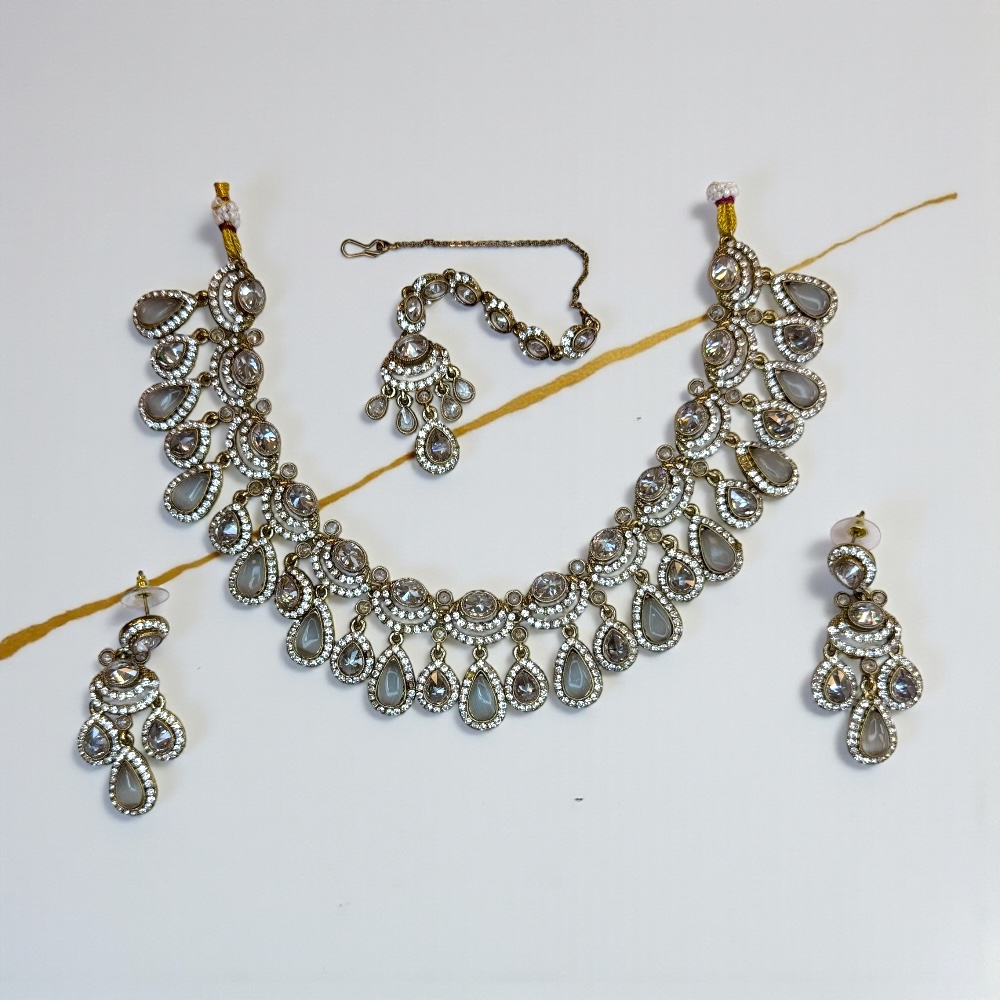 Silver base bridal jewellery set with clear zircon stones