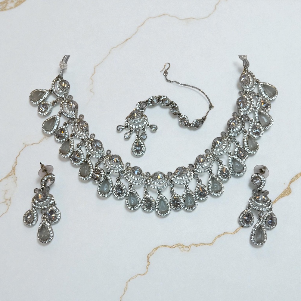Silver base bridal jewellery set with clear zircon stones