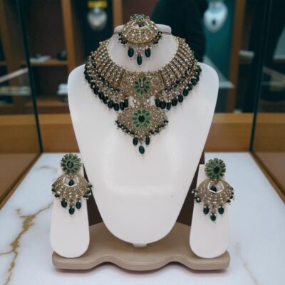 Emerald green stone traditional necklace and earrings set for brides